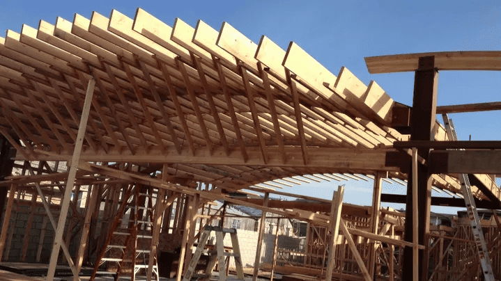 large archway structure in the process of being framed general contractor hami construction inc